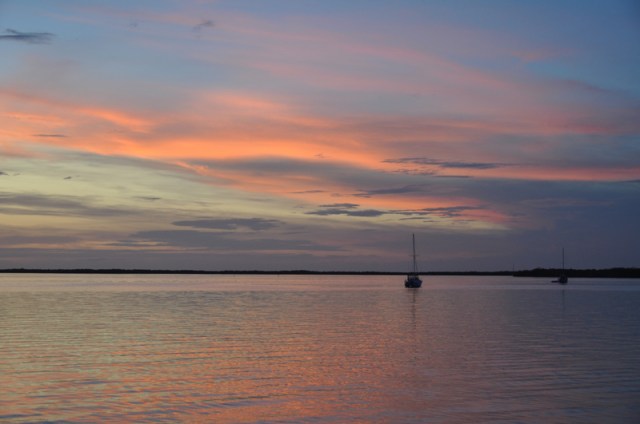#3 – another very tranquil scene, but with such lovely colors. I love how the wispy color flows across the sky to be reflected in the water below. Again, there are the boats to add to the stillness of the evening.