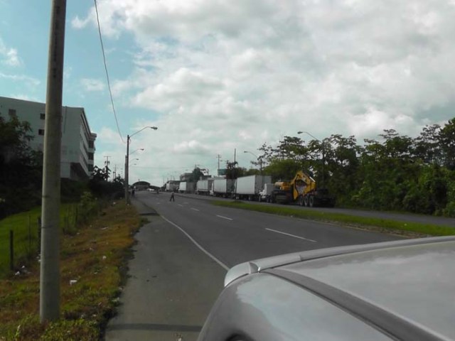 As you are getting close to the spot, this is what it looks like. The main thing we noticed was all the trucks lined up along side the road.