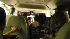 The bus back to David was crowded, sometimes standing room only! You can see here that one person was evening sitting backwards on the engine next to the driver. The bus had to pass some people flagging it down because there was no room. 