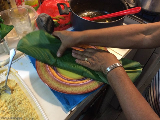 Folding a tamale