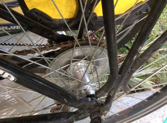 Now I have a nice plastic guard thing so the chain can't wedge itself down in there again. 